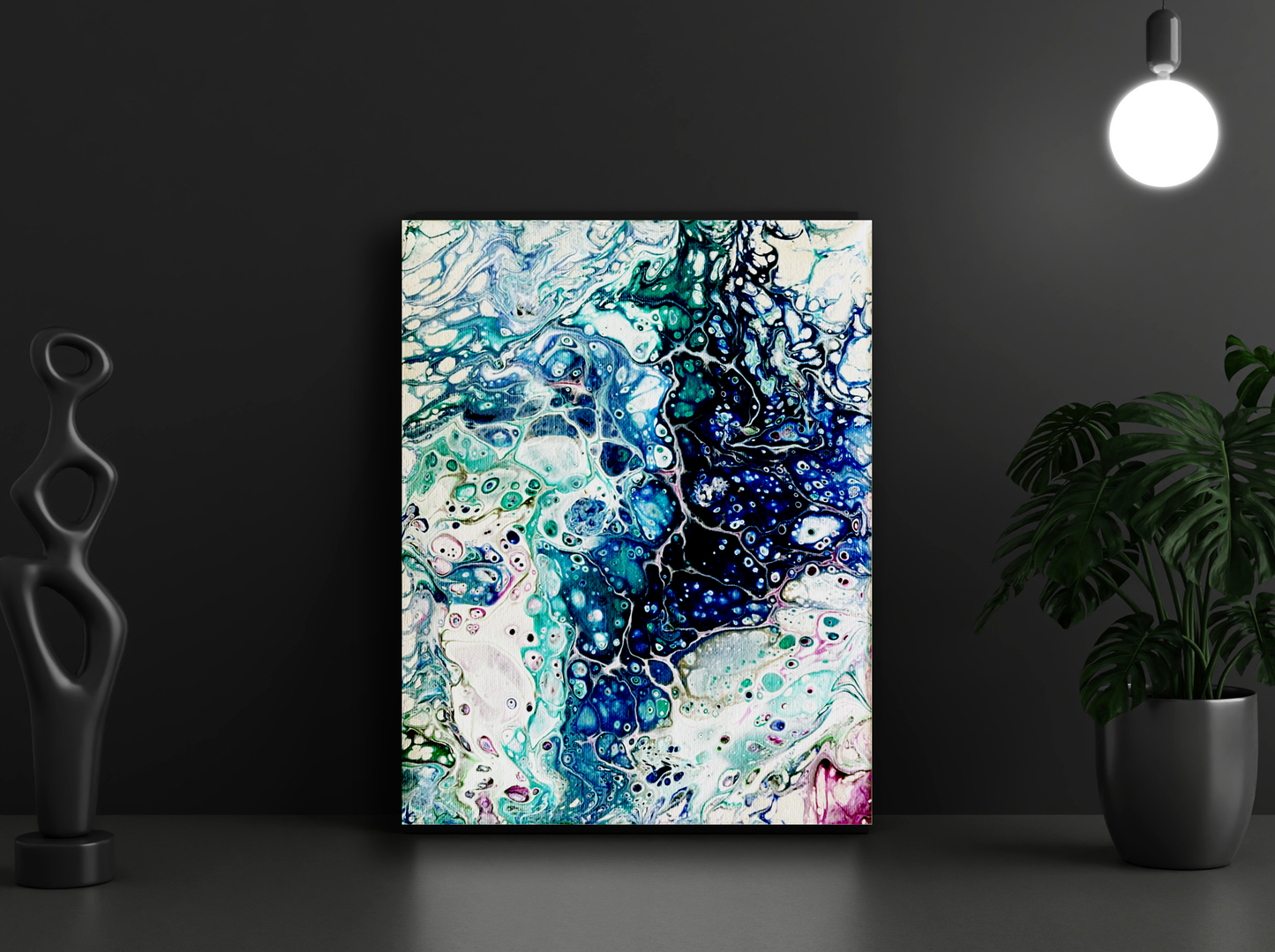abstract painting of blues, aqua, splash of pink with large cells of colors within colors
