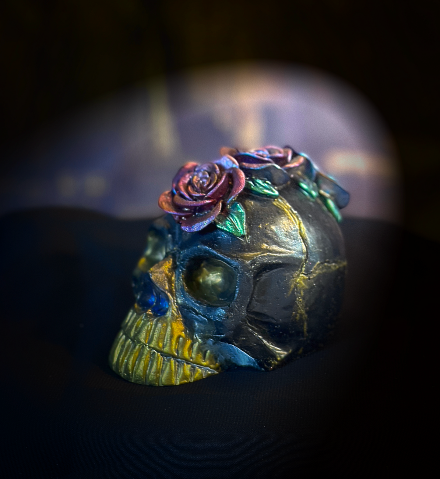 Decorative skull with flowers on a dark background